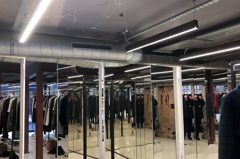 Ducted air conditioner maintenance at a clothing store.