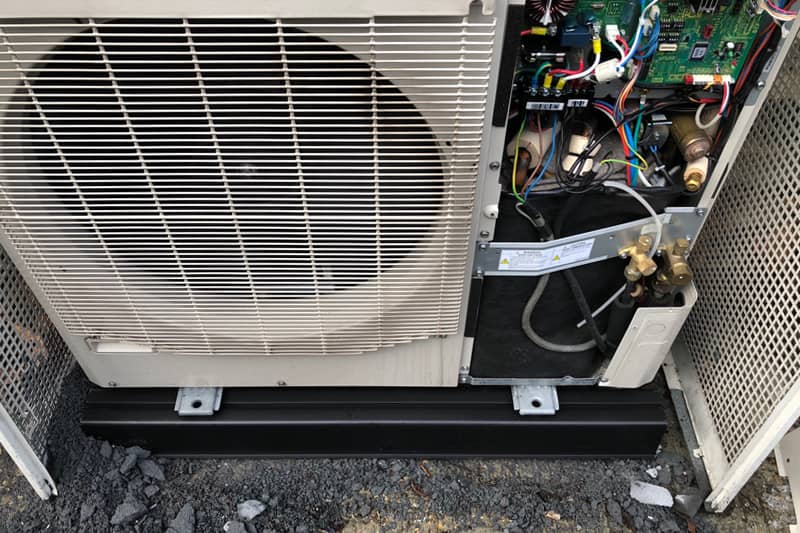 External air conditioning unit open for repair.