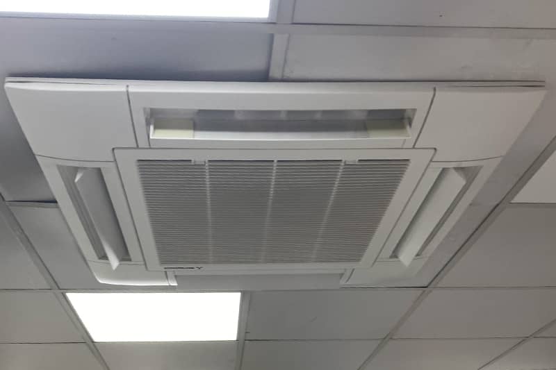 Air conditioner maintenance at a petrol station.