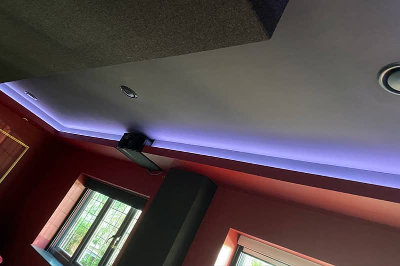 Ducted air conditioning installed in a home cinema.