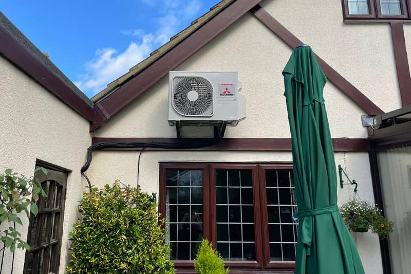 External Mitsubishi Air-Cooled Inverter on the outside of a domestic property.