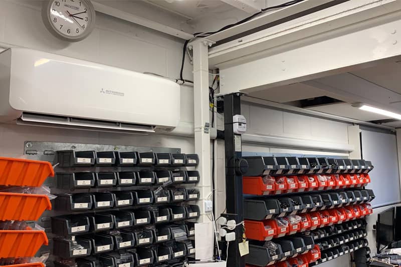 Wall mounted Mitsubishi air conditioner installed at a hardware store.